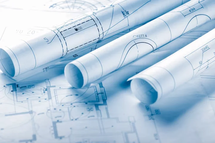 Rolled architectural blueprints